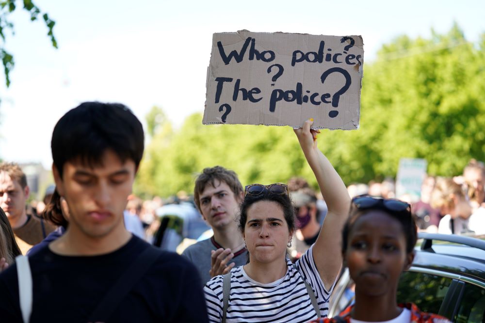 People gather for a Black Lives Matter demonstration in front of the US Embassy in Copenhagen, Denmark, Sunday, May 31, 2020. Protesters gathered in front of the embassy under the heading 'I Can't Breathe', to express their feelings in regard to the death of 46-year old George Floyd while in police custody in Minneapolis, USA. (Ida Guldbaek Arentsen/Ritzau scanpix via AP)