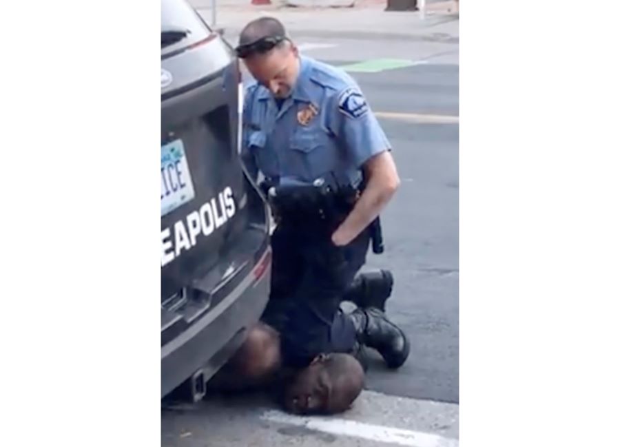  In this Monday, May 25, 2020, file frame from video provided by Darnella Frazier, a Minneapolis officer kneels on the neck of George Floyd, a handcuffed man who was pleading that he could not breathe. The death of Floyd has renewed scrutiny of immobilization techniques long used in policing around the world. (Darnella Frazier via AP, File)