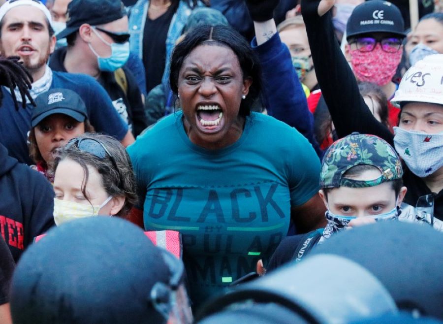 A demonstrator reacts during a rally following the death in Minneapolis police custody of George Floyd, in Boston, Massachusetts, U.S., June 2, 2020 - REUTERS/Brian Snyder