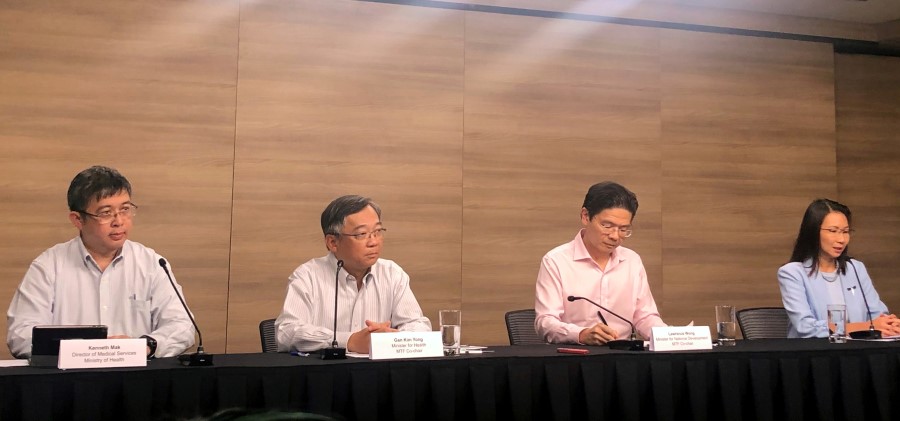 Members of the multi-ministry taskforce, Director of Medical Services at the Ministry of Health Kenneth Mark, Minister of Health Gan Kim Yong, Minister of National Development Lawrence Wong and Liew Wei Li, Director of Schools, Ministry of Education, give a news conference after raising the coronavirus outbreak alert to Orange in Singapore, February 7, 2020. REUTERS/Aradhana Aravinda