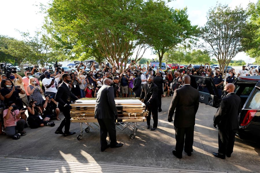 The casket of George Floyd is removed after a public visitation for Floyd at the Fountain of Praise church, Monday, June 8, 2020, in Houston, U.S. David J. Phillip/Pool via REUTERS