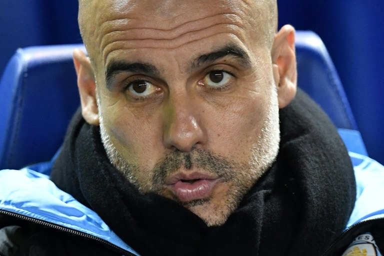 Manchester City manager Pep Guardiola says he does not like the idea of matches being played behind closed doors  © Paul ELLIS - AFP/File