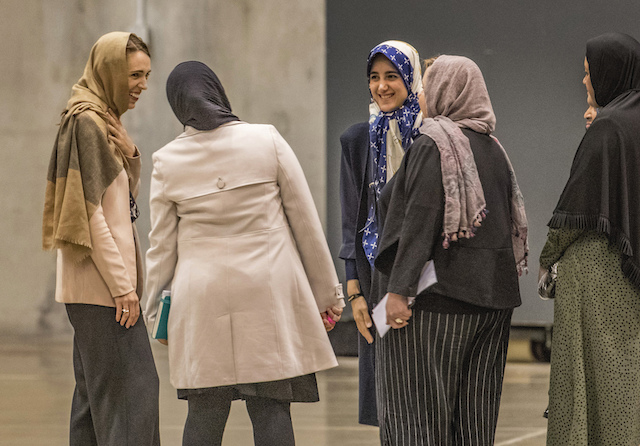 New Zealand Prime Minister Jacinda Ardern, left, talks with women during Friday prayers in Christchurch, New Zealand, Friday, March 13, 2020. (John Kirk-Anderson/Pool Photo via AP)