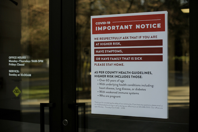 A sign explains health guidelines, after standard in-person services were canceled following reports of coronavirus disease (COVID-19) cases in the country, at Eastside Church in Bothell, Washington, U.S. March 15, 2020. REUTERS/David Ryder