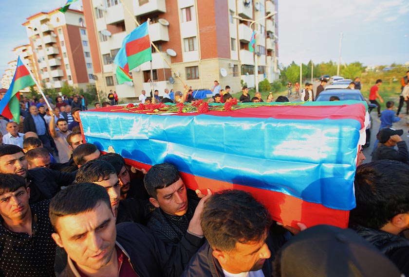 People carry the coffin of a member of Azerbaijani Armed Forces who was allegedly killed during the fighting over the breakaway region of Nagorno-Karabakh. REUTERSpic