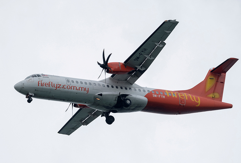 A Firefly ATR 72-500 airplane approaches to land at Changi International Airport in Singapore June 10, 2018. - REUTERS