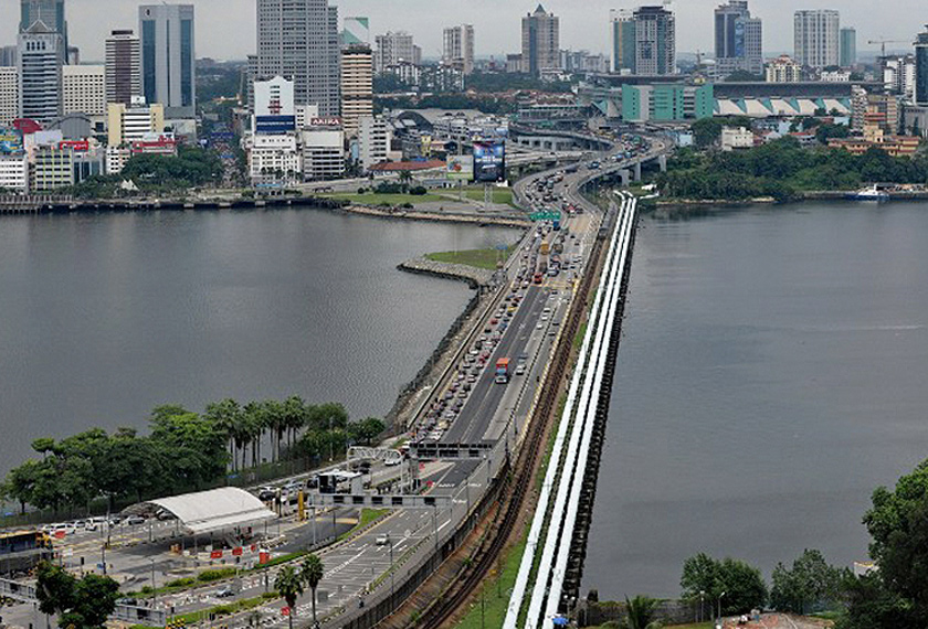 In August, Malaysia established the Reciprocal Green Lane (RGL) and Periodic Commuting Arrangement (PCA) with Singapore. - EPA