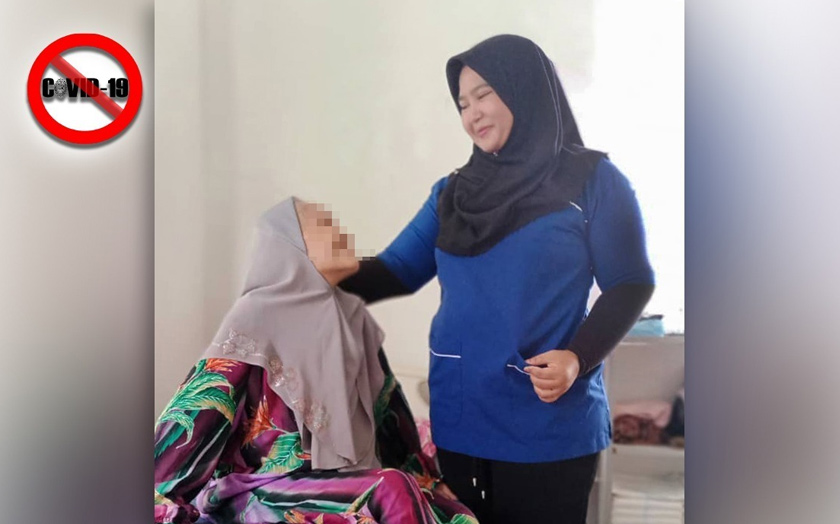Seorang pesakit Alzheimer yang mahu dikenali sebagai Nek Rahmah (kiri) ketika ditemui di Pusat Jagaan Husna Arrashid. -- Gambar ihsan Rumah Husna Arrashid