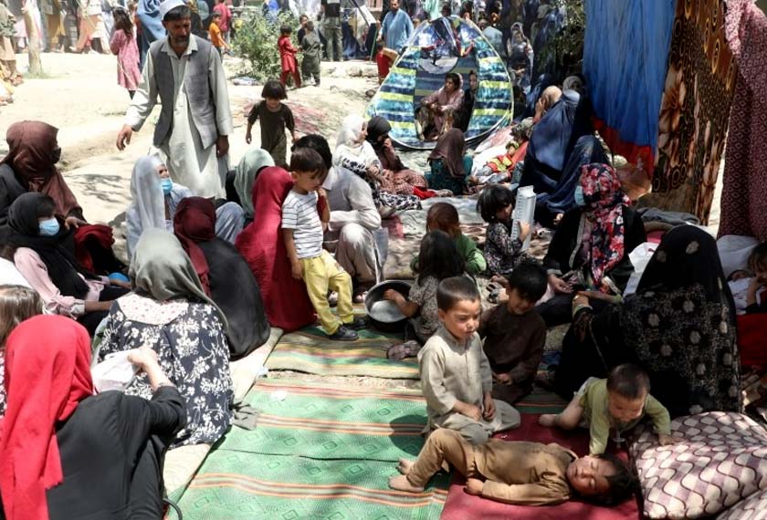 Internally displaced families from northern provinces, who fled from their homes due the fighting between Taliban and Afghan security forces, take shelter in a public park in Kabul, Afghanistan, August 10, 2021. -REUTERS