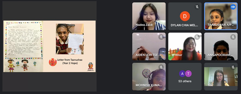 Students presenting their letters and e-cards to World Vision. - Photo by Campus Rangers