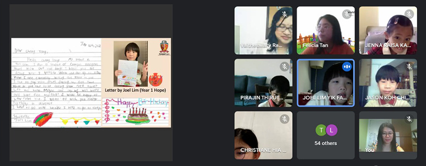 Students presenting their letters and e-cards to World Vision. - Photo by Campus Rangers