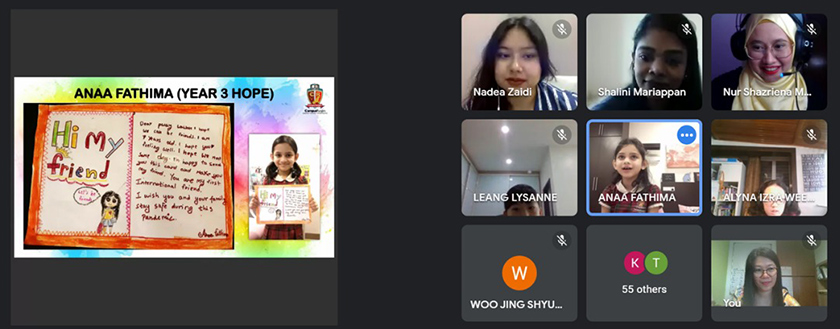 Students presenting their letters and e-cards to World Vision. - Photo by Campus Rangers