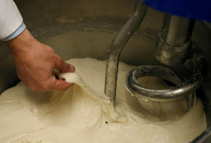Reydellet checks French baguettes dough at 