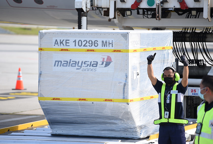 A container carrying the first batch of Pfizer-BioNTech COVID-19 vaccines is seen at the MASkargo Complex in Sepang, Malaysia February 21, 2021. Malaysia Information Department/Fandy Azlan/Handout via REUTERS 