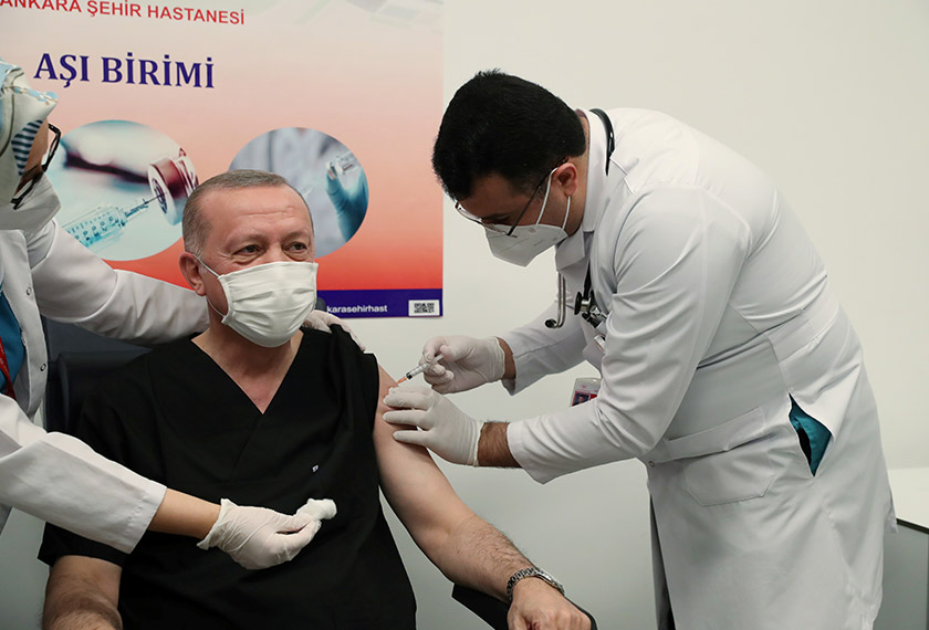 Turkish President Tayyip Erdogan receives a shot of the Sinovac's CoronaVac coronavirus disease (COVID-19) vaccine at Ankara City Hospital?in Ankara, Turkey, January 14, 2021. Murat Cetinmuhurdar. REUTERS