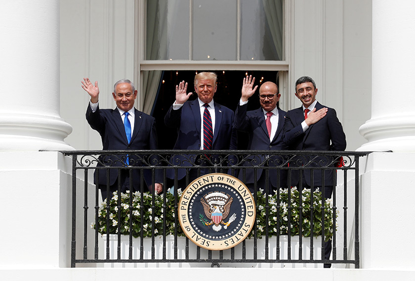  Israel's Prime Minister Benjamin Netanyahu, U.S. President Donald Trump, Bahrain's Foreign Minister Abdullatif Al Zayani and United Arab Emirates (UAE) Foreign Minister Abdullah bin Zayed wave from the White House balcony after a signing ceremony for the Abraham Accords. REUTERS/Tom Brenner/File Photo