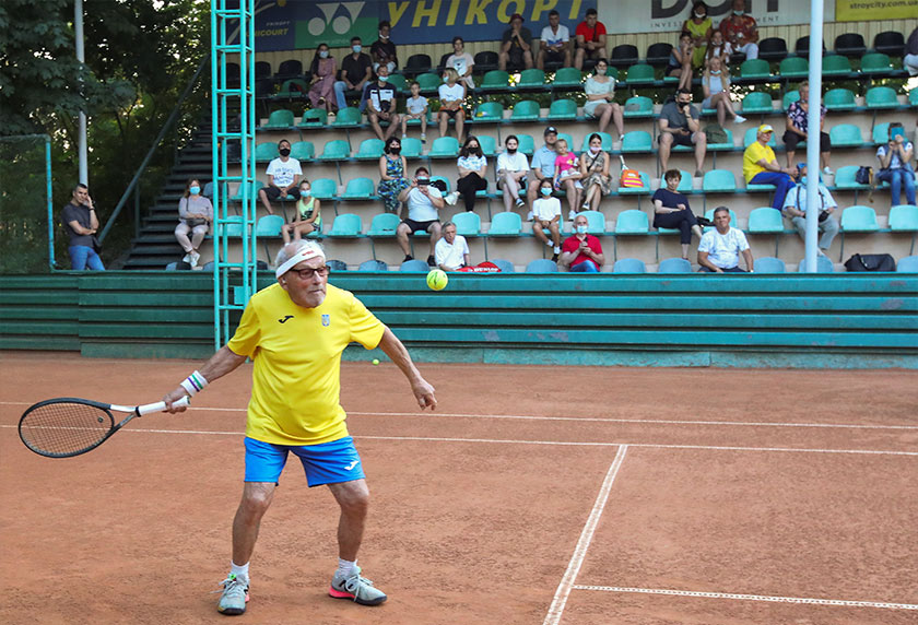 The world's oldest tennis player Ukrainian Leonid Stanislavskyi, 97, practices on court in Kharkiv, Ukraine July 7, 2021. Picture taken July 7, 2021. REUTERS/Vyacheslav Madiyevskyy