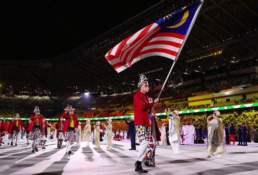 Kontinjen Malaysia merupakan negara ke-177 berarak masuk ke stadium. - Foto REUTERS