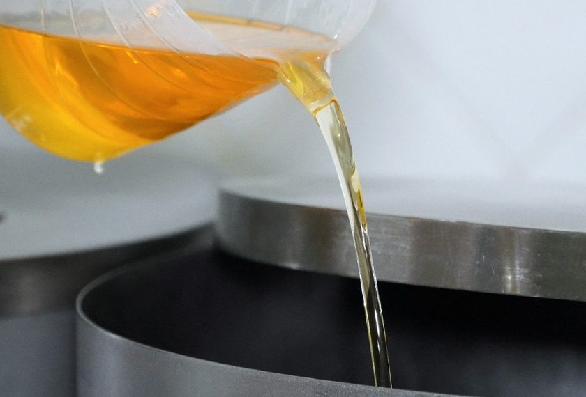Argan oil is poured into a container, at Women's Agricultural Cooperative Taitmatine, in Tiout, near Taroudant, Morocco, REUTERSpic