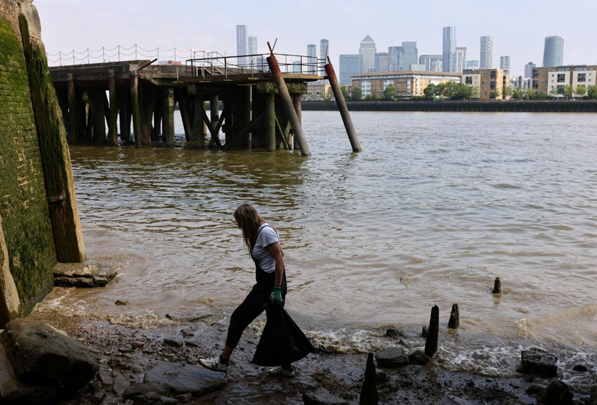 Blathwayt collects plastics found washed up on the banks of the river Thames, in Deptford, London, before turning them into card designs in London, Britain. REUTERSpic