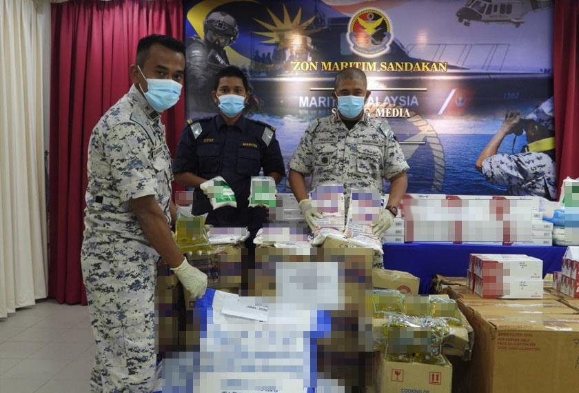 Antara barangan yang ditemui di dalam sebuah kenderaan pacuan empat roda  serta sebuah van tanpa pemandu di kawasan berdekatan. - Foto Maritim Malaysia