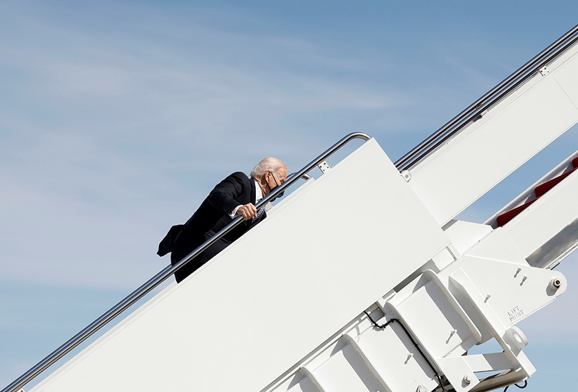 Joe Biden appeared to trip on the steps twice before falling out of sight. - AP