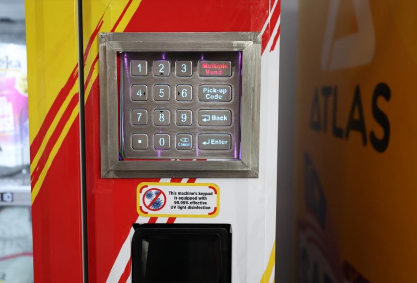 Mesin layan diri yang dilengkapi papan kekunci dengan teknologi UV. - Foto ATLAS Vending