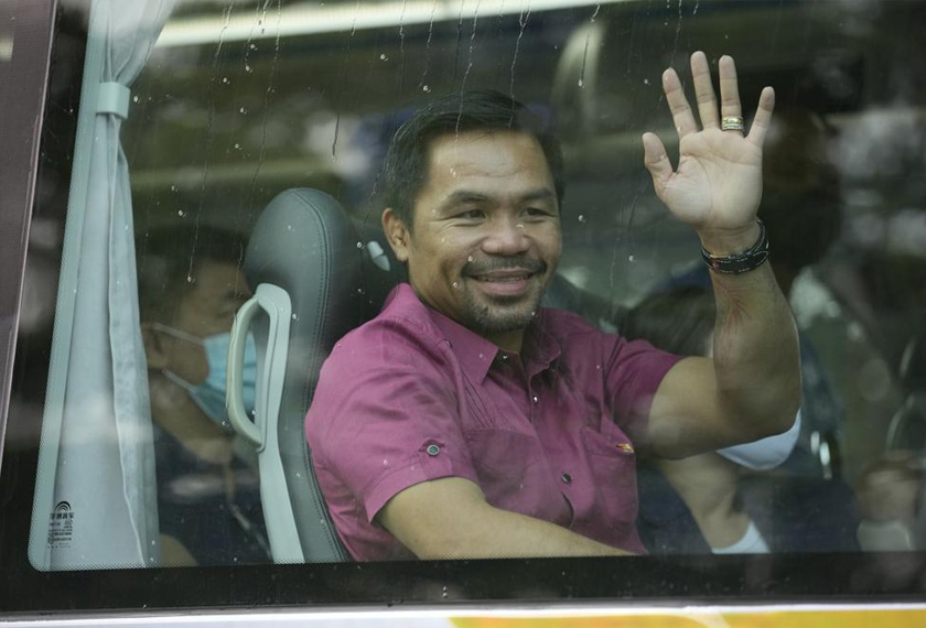 Wira tinju dan juga senator Manny Pacquiao menguji pengaruhnya dalam landskap politik Filipina. - AP