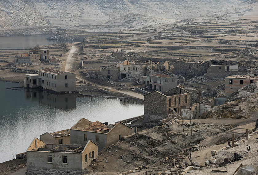 the ancient village of Aceredo that had been submerged by Limia river in the 1990s after the dam was built in Concello de Lobios, Spain, February 10, 2022. Picture taken February 10, 2022. REUTERS/Miguel Vidal REFILE - QUALITY REPEAT