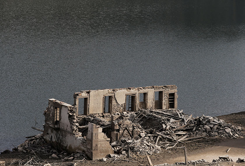 the ancient village of Aceredo that had been submerged by Limia river in the 1990s after the dam was built in Concello de Lobios, Spain, February 10, 2022. Picture taken February 10, 2022. REUTERS/Miguel Vidal REFILE - QUALITY REPEAT