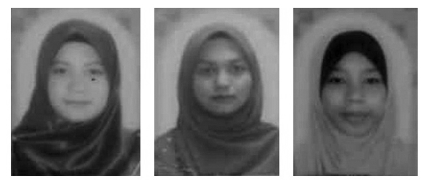 Jenazah tiga bersaudara Syariatul Nurfatihah Mohd Dera, 28, (kiri) dan adiknya Syariatul Noor Syafiqa, 26, (tengah) serta sepupu mereka Siti Aisyah Mazalan, 19, (kanan) selamat dibumikan. - Foto BERNAMA