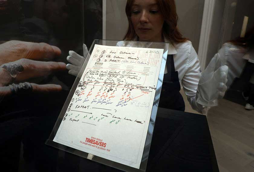 A handwritten manuscript of working lyrics to 'Somebody to Love', courtesy of Queen Music Ltd / Sony Music Publishing UK Ltd, is displayed during Sotheby's 'Freddie Mercury: A World of His Own' press preview, in London, Britain. - REUTERS