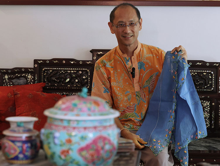 ethnologist Dr David Neo’s many prized possessions of Peranakan Baba Nyonya heritage is his collection of Nyonya embroidery. - via BERNAMA