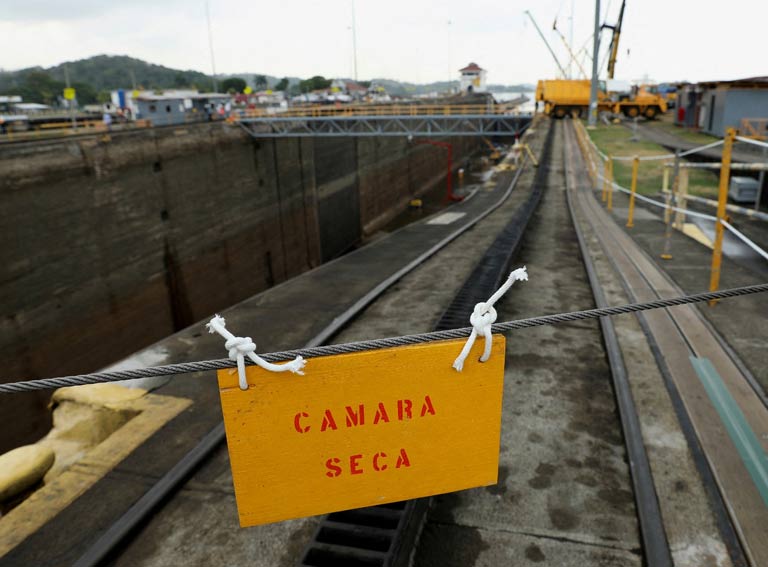 A sign reads 'Dry Chamber' during the periodical maintenance of the West Lane of Pedro Miguel locks at the Panama Canal, in Panama City, Panama. - REUTERS