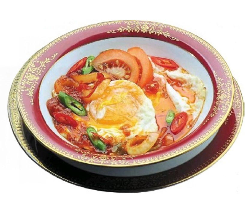 One of Tunku Abdul Rahman's favourite dish, Fried Eggs in Tomato Sauce. - Kalsom Taib/Filepic