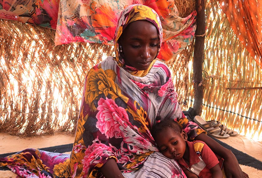 Hanan Idriss, a 22-year-old mother of two, said she pretended to be having her menstrual cycle, while her sister warned militiamen that she was HIV positive, Adre, Chad. - REUTERS/El Tayeb Siddig