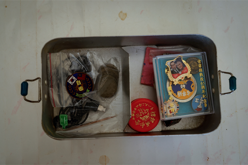 Old photos belonging to Wang Chih-chuan, 93, and displayed for the camera, can be seen in his room at Taoyuan Veterans Home in Taoyuan, Taiwan. - REUTERS