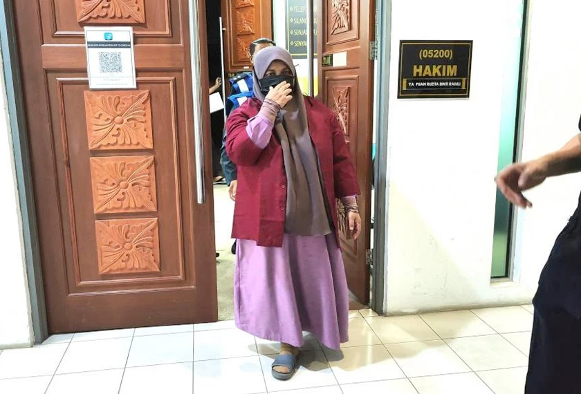Wan Maseri berjubah ungu ketika hadir di Mahkamah Tinggi Syariah Negeri Sembilan. - Foto Sinar Harian
