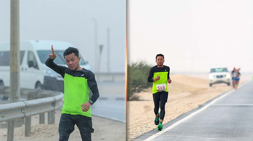 Pelari Piung Runners, Radzzi Ramly meredah hujan dalam sektor empat (Gambar: Wan Ahmad Tajuddin/ Malaysian Association of Qatar)