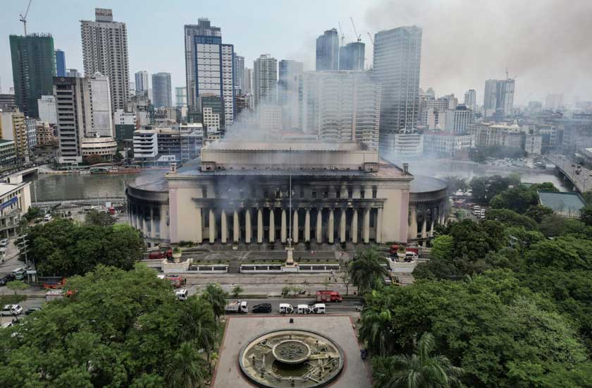 Smoke rises from the burning Manila Central Post Office building after a massive fire, in Manila, Philippines, May 22, 2023. REUTERS
