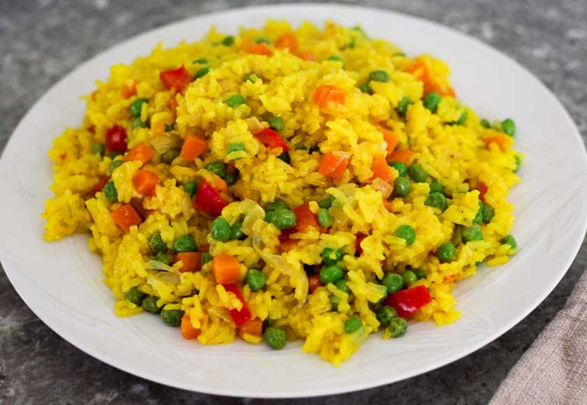 In South Asia, people often cook saffron rice with fragrant spices like cinnamon, caraway seeds and cardamom pods. - Unsplash