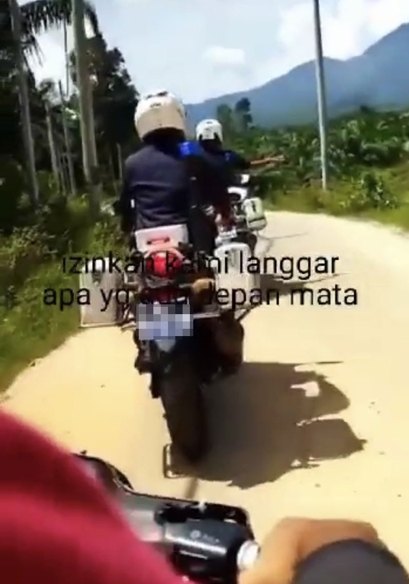 Tangkap layar video yang tular di media sosial.