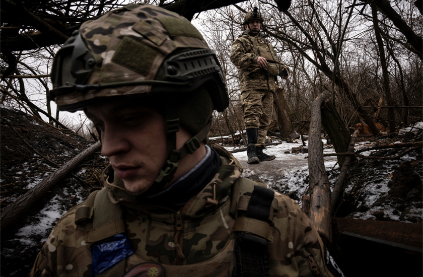 Odin (R), 32, a commander in the 28th Separate Mechanized Brigade who lost his right lower leg in late 2022 during the liberation of Kherson, talks to a subordinate at a mortar position, in the Donetsk region, Ukraine. - REUTERS/Thomas Peter 