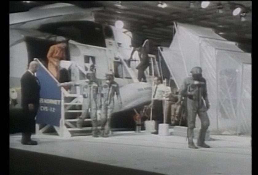 Crew members exiting aircraft upon arriving back on earth, July 1969. - Screenshot/NASA/NBC/REUTERS