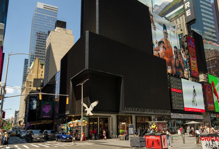 People stand near the blacked-out digital billboards at Times Square following a global IT outage, in New York City, US July 19, 2024. - REUTERS/David 'Dee' Delgado