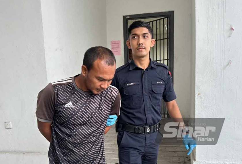 Mohd Irwan (kiri) yang dihadapkan ke mahkamah atas tuduhan amang seksual terhadap kanak-kanak sembilan tahun. - Foto Sinar Harian
