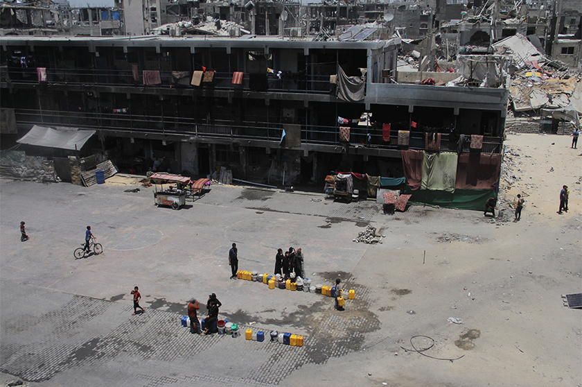 Displaced Palestinians wait in a queue as Gazan families struggle with water pollution and scarcity, amid the ongoing conflict between Israel and Hamas, in Jabalia refugee camp, in the northern Gaza Strip. - REUTERS