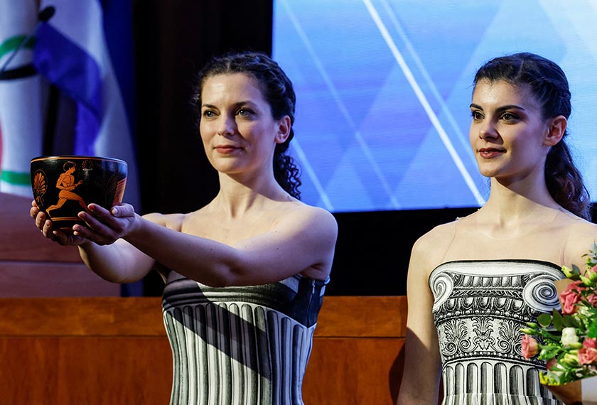 Actresses show the new cauldron and wear the new priestesses costumes, for next month's Paris 2024 Olympics flame lighting ceremony, during a presentation at the Olympic Committee Headquarters in Athens, Greece. - REUTERS