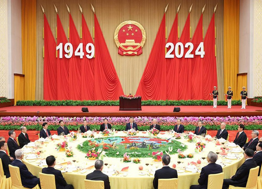 The Communist Party of China and state leaders Xi Jinping, Li Qiang, Zhao Leji, Wang Huning, Cai Qi, Ding Xuexiang, Li Xi and Han Zheng attend a reception to celebrate the 75th anniversary of the founding of the People's Republic of China together with around 3,000 Chinese and foreign guests at the Great Hall of the People in Beijing, capital of China, Sept. 30, 2024. - Xinhua