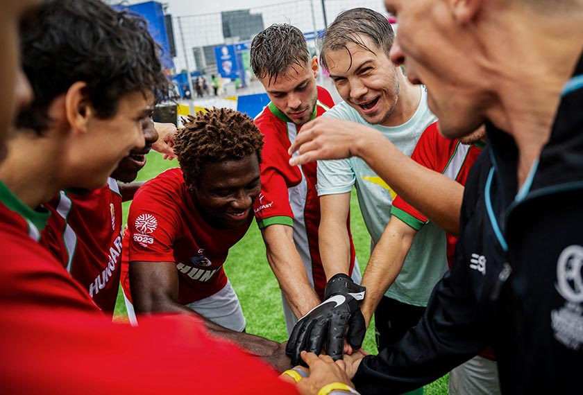 Hungary team members encourage each other before the match against Italy at the Homeless Euro 2024 tournament in Hamburg, Germany, June 18, 2024. - REUTERS/Filepic